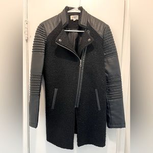Lightly worn, faux leather coat. Perfect addition to your wardrobe!